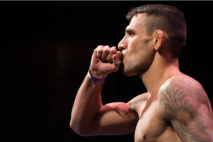 DALLAS, TX - MARCH 13: Rafael Dos Anjos stands on the scale during the UFC 185 weigh-ins at the Kay Bailey Hutchison Convention Center on March 13, 2015 in Dallas, Texas. (Photo by Cooper Neill/Zuffa LLC/Zuffa LLC via Getty Images)