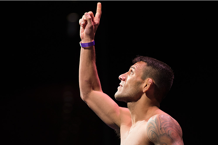 DALLAS, TX - MARCH 13: Rafael Dos Anjos stands on the scale during the UFC 185 weigh-ins at the Kay Bailey Hutchison Convention Center on March 13, 2015 in Dallas, Texas. (Photo by Cooper Neill/Zuffa LLC/Zuffa LLC via Getty Images)