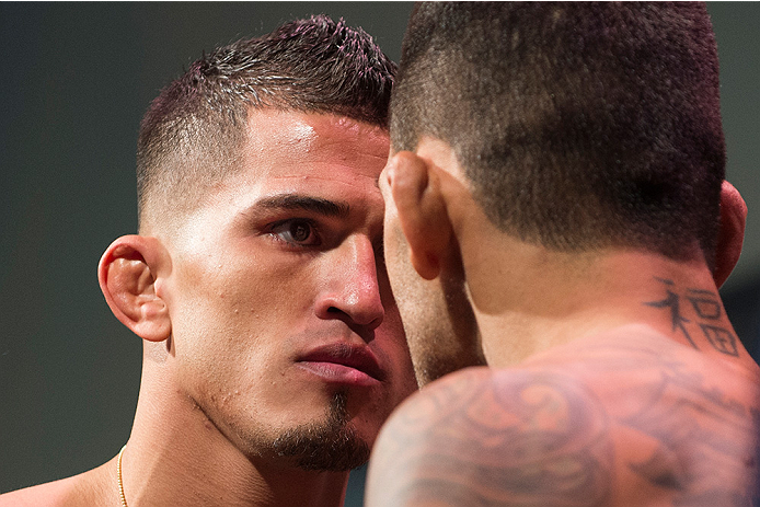 DALLAS, TX - MARCH 13: Anthony Pettis faces off with Rafael Dos Anjos during the UFC 185 weigh-ins at the Kay Bailey Hutchison Convention Center on March 13, 2015 in Dallas, Texas. (Photo by Cooper Neill/Zuffa LLC/Zuffa LLC via Getty Images)