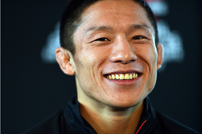 MONTREAL, QC - APRIL 23:  UFC flyweight title challenger Kyoji Horiguchi interacts with media during the UFC 186 Ultimate Media Day at Scena on April 23, 2015 in Montreal, Quebec, Canada. (Photo by Jeff Bottari/Zuffa LLC/Zuffa LLC via Getty Images)