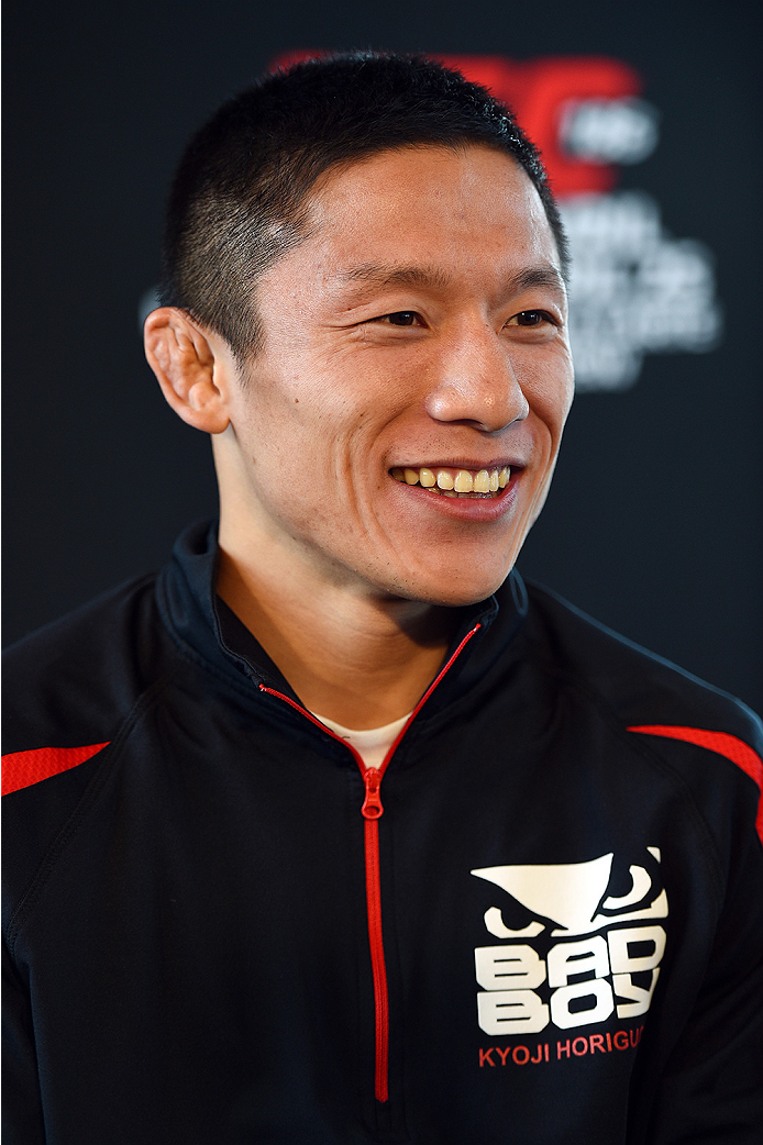 MONTREAL, QC - APRIL 23: UFC flyweight title challenger Kyoji Horiguchi interacts with media during the UFC 186 Ultimate Media Day at Scena on April 23, 2015 in Montreal, Quebec, Canada. (Photo by Jeff Bottari/Zuffa LLC/Zuffa LLC via Getty Images)