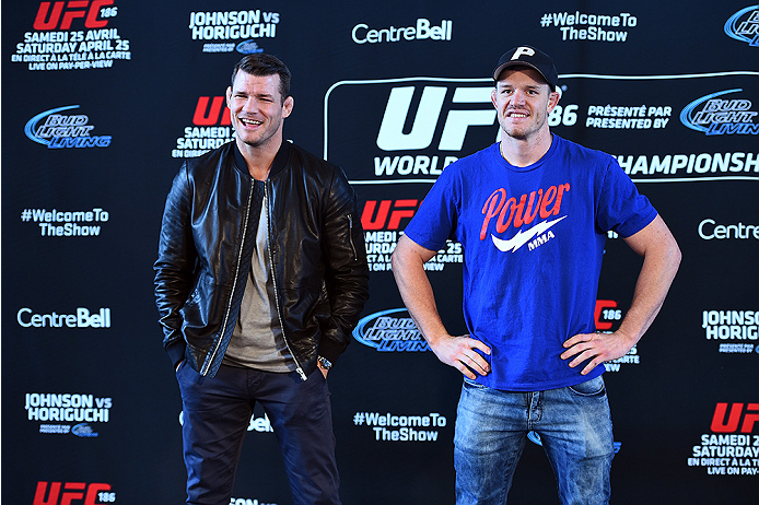 MONTREAL, QC - APRIL 23:  (L-R) Michael Bisping and CB Dollaway face off for the media during the UFC 186 Ultimate Media Day at Scena on April 23, 2015 in Montreal, Quebec, Canada. (Photo by Jeff Bottari/Zuffa LLC/Zuffa LLC via Getty Images)