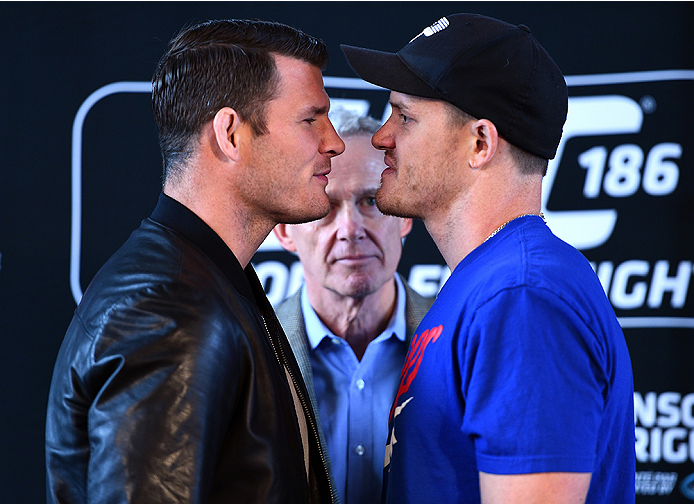 MONTREAL, QC - APRIL 23:  (L-R) Michael Bisping and CB Dollaway face off for the media during the UFC 186 Ultimate Media Day at Scena on April 23, 2015 in Montreal, Quebec, Canada. (Photo by Jeff Bottari/Zuffa LLC/Zuffa LLC via Getty Images)