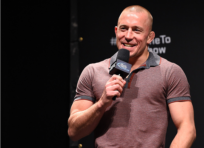 MONTREAL, QC - APRIL 24:   Former UFC welterweight champion Georges St-Pierre interacts with fans during a Q&A session before the UFC 186 weigh-in at Metropolis on April 24, 2015 in Montreal, Quebec, Canada. (Photo by Josh Hedges/Zuffa LLC/Zuffa LLC via G