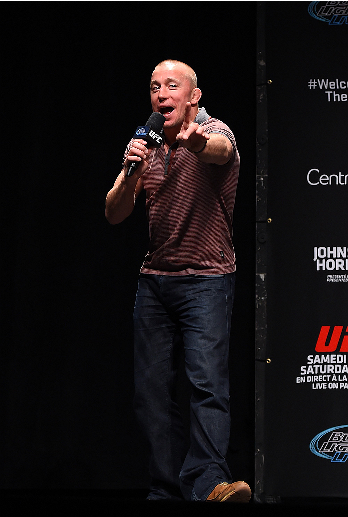 MONTREAL, QC - APRIL 24:   Former UFC welterweight champion Georges St-Pierre interacts with fans during a Q&A session before the UFC 186 weigh-in at Metropolis on April 24, 2015 in Montreal, Quebec, Canada. (Photo by Josh Hedges/Zuffa LLC/Zuffa LLC via G