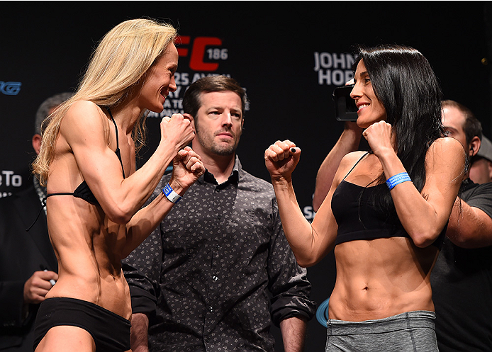 MONTREAL, QC - APRIL 24:   (L-R) Opponents Jessica Rakoczy of the United States and Valerie Letourneau of Canada face off during the UFC 186 weigh-in at Metropolis on April 24, 2015 in Montreal, Quebec, Canada. (Photo by Josh Hedges/Zuffa LLC/Zuffa LLC vi