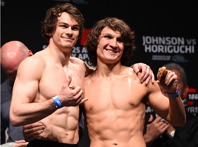 MONTREAL, QC - APRIL 24:   (L-R) Opponents Olivier Aubin-Mercier of Canada and David Michaud of the United States pose for photos during the UFC 186 weigh-in at Metropolis on April 24, 2015 in Montreal, Quebec, Canada. (Photo by Josh Hedges/Zuffa LLC/Zuff