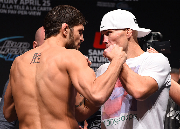 MONTREAL, QC - APRIL 24:   (L-R) Opponents Patrick Cote of Canada and Joe Riggs of the United Sates face off during the UFC 186 weigh-in at Metropolis on April 24, 2015 in Montreal, Quebec, Canada. (Photo by Josh Hedges/Zuffa LLC/Zuffa LLC via Getty Image