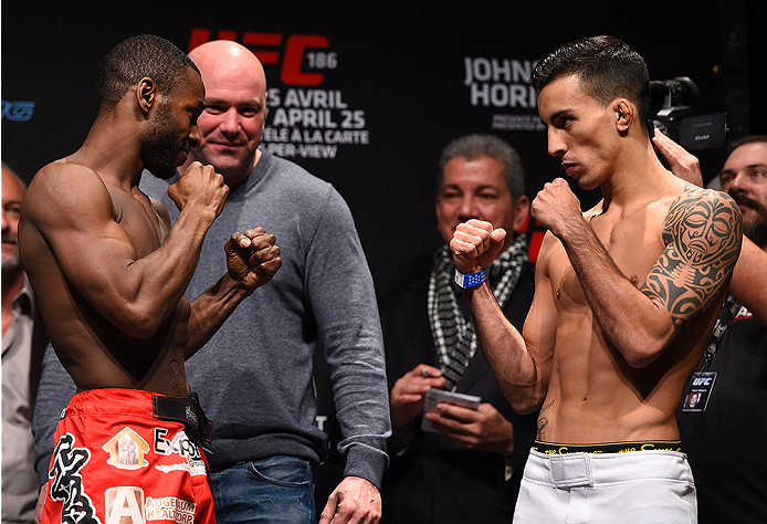 MONTREAL, QC - APRIL 24:   (L-R) Opponents Yves Jabouin of Canada and Thomas Almeida of Brazil face off during the UFC 186 weigh-in at Metropolis on April 24, 2015 in Montreal, Quebec, Canada. (Photo by Josh Hedges/Zuffa LLC/Zuffa LLC via Getty Images)