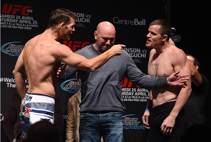 MONTREAL, QC - APRIL 24:   (L-R) Opponents Michael Bisping of England and CB Dolloway of the United States face off during the UFC 186 weigh-in at Metropolis on April 24, 2015 in Montreal, Quebec, Canada. (Photo by Josh Hedges/Zuffa LLC/Zuffa LLC via Gett