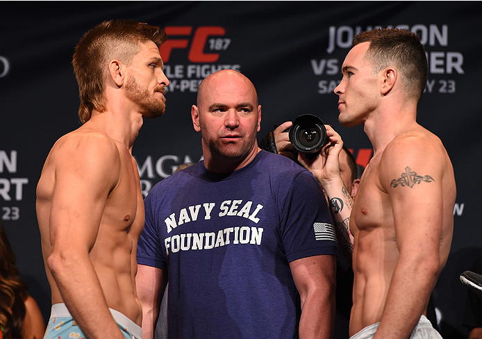 LAS VEGAS, NV - MAY 22:   (L-R) Opponents Mike Pyle and Colby Covington face off during the UFC 187 weigh-in at the MGM Grand Conference Center on May 2, 2015 in Las Vegas, Nevada. (Photo by Josh Hedges/Zuffa LLC/Zuffa LLC via Getty Images)