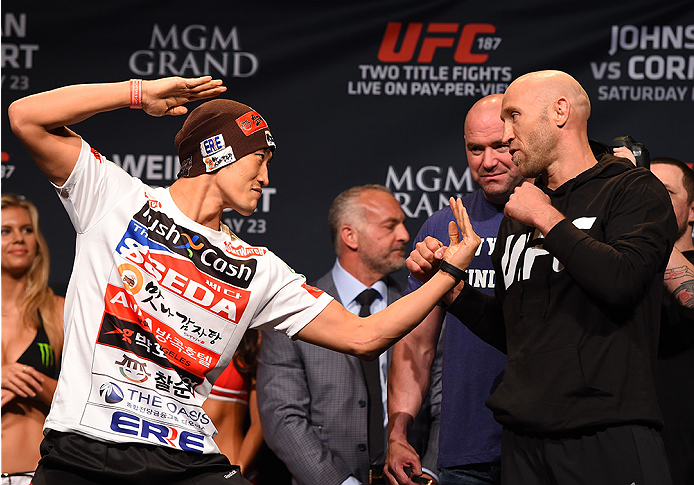 LAS VEGAS, NV - MAY 22: (L-R) Opponents Dong Hyun Kim of South Korea and Josh Burkman face off during the UFC 187 weigh-in at the MGM Grand Conference Center on May 22, 2015 in Las Vegas, Nevada. (Photo by Josh Hedges/Zuffa LLC/Zuffa LLC via Getty Image