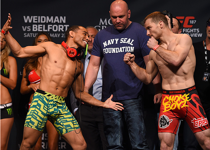 LAS VEGAS, NV - MAY 22:   (L-R) Opponents John Dodson and Zach Makovsky face off during the UFC 187 weigh-in at the MGM Grand Conference Center on May 22, 2015 in Las Vegas, Nevada. (Photo by Josh Hedges/Zuffa LLC/Zuffa LLC via Getty Images)