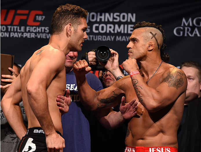 LAS VEGAS, NV - MAY 22:   (L-R) Chris Weidman and Vitor Belfort of Brazil face off during the UFC 187 weigh-in at the MGM Grand Conference Center on May 2, 2015 in Las Vegas, Nevada. (Photo by Josh Hedges/Zuffa LLC/Zuffa LLC via Getty Images)