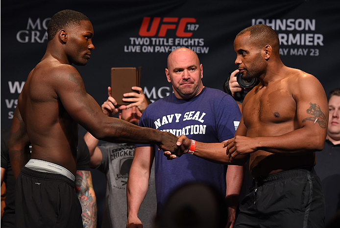 LAS VEGAS, NV - MAY 22:   (L-R) Opponents Anthony 'Rumble' Johnson and Daniel Cormier shake hands during the UFC 187 weigh-in at the MGM Grand Conference Center on May 2, 2015 in Las Vegas, Nevada. (Photo by Josh Hedges/Zuffa LLC/Zuffa LLC via Getty Image