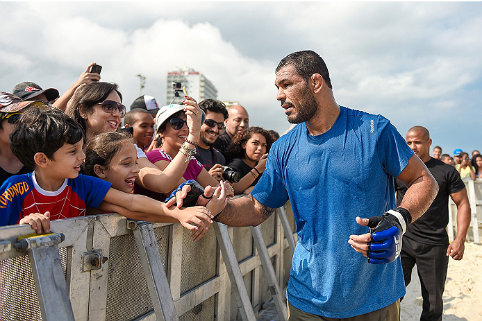 RIO DE JANEIRO, BRAZIL - JULY 29:  Heavyweight contender Antonio Rodrigo 'Minotauro' Nogueira of Brazil takes photos with fans during open training session at Pepe Beach on July 29, 2015 in Rio de Janeiro, Brazil.  (Photo by Buda Mendes/Zuffa LLC/Zuffa LL