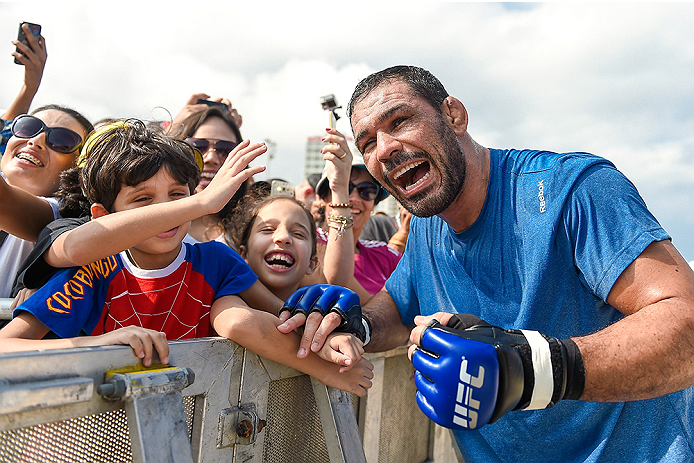 RIO DE JANEIRO, BRAZIL - JULY 29:  Heavyweight contender Antonio Rodrigo 'Minotauro' Nogueira of Brazil takes photos with fans during open training session at Pepe Beach on July 29, 2015 in Rio de Janeiro, Brazil.  (Photo by Buda Mendes/Zuffa LLC/Zuffa LL