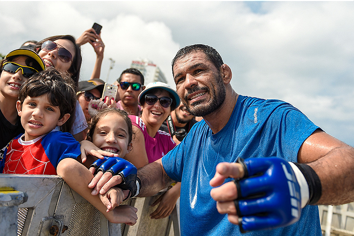RIO DE JANEIRO, BRAZIL - JULY 29: Heavyweight contender Antonio Rodrigo 'Minotauro' Nogueira of Brazil takes photos with fans during open training session at Pepe Beach on July 29, 2015 in Rio de Janeiro, Brazil. (Photo by Buda Mendes/Zuffa LLC/Zuffa LL