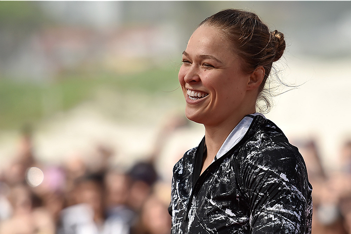 RIO DE JANEIRO, BRAZIL - JULY 29: Womens bantamweight champion Ronda Rousey of the United States smiles during open training session at Pepe Beach on July 29, 2015 in Rio de Janeiro, Brazil. (Photo by Buda Mendes/Zuffa LLC/Zuffa LLC via Getty Images)