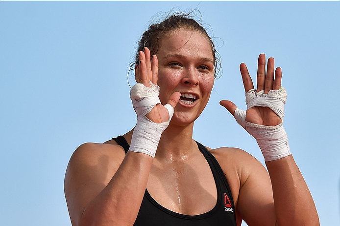 RIO DE JANEIRO, BRAZIL - JULY 29:  Womens bantamweight champion Ronda Rousey of the United States nods to fans during open training session at Pepe Beach on July 29, 2015 in Rio de Janeiro, Brazil.  (Photo by Buda Mendes/Zuffa LLC/Zuffa LLC via Getty Imag