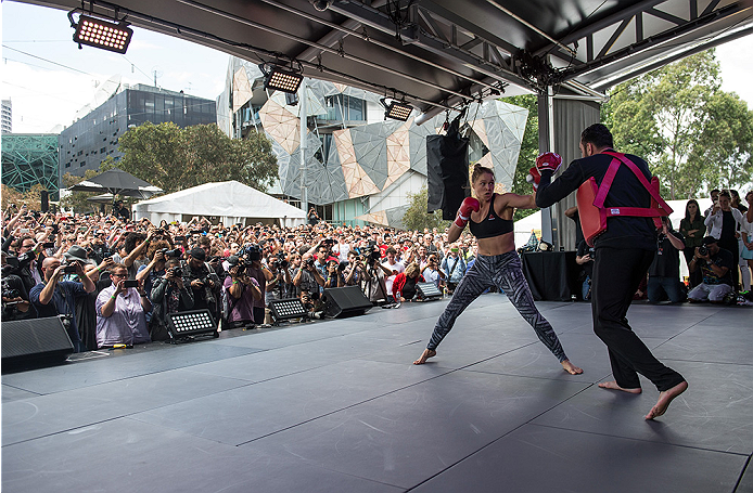 MELBOURNE, AUSTRALIA - NOVEMBER 12:  UFC women's bantamweight champion Ronda Rousey of the United States holds an open workout for fans and media at Federation Square on November 12, 2015 in Melbourne, Australia. (Photo by Brandon Magnus/Zuffa LLC/Zuffa L