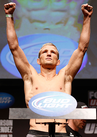 SAN JOSE, CA - APRIL 19: T.J. Dillashaw weighs in during the UFC on FOX weigh-in at the California Theatre on April 19, 2013 in San Jose, California. (Photo by Josh Hedges/Zuffa LLC/Zuffa LLC via Getty Images)