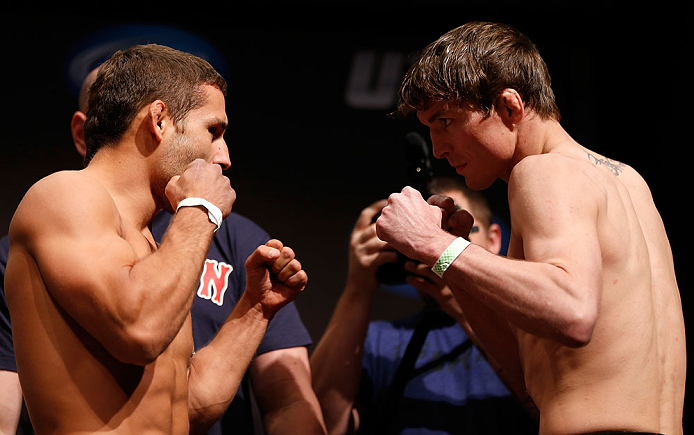 SAN JOSE, CA - APRIL 19:   (L-R) Opponents Chad Mendes and Darren Elkins face off during the UFC on FOX weigh-in at the California Theatre on April 19, 2013 in San Jose, California.  (Photo by Josh Hedges/Zuffa LLC/Zuffa LLC via Getty Images)