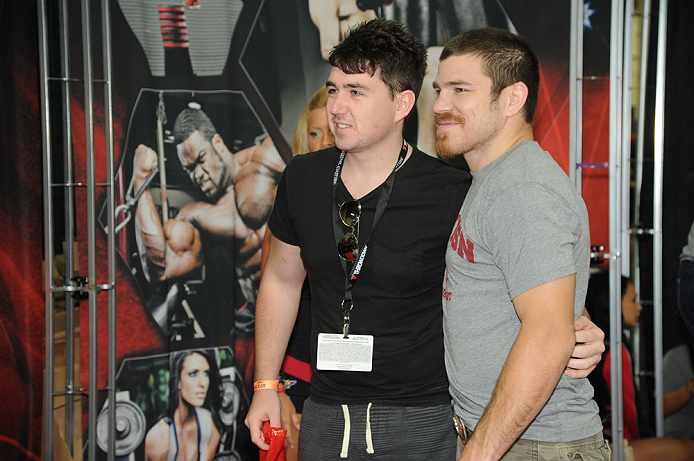 LAS VEGAS, NV - JULY 7: Jim Miller poses with a fan during the UFC Fan Expo at the Mandalay Bay Convention Center on July 7, 2012 in Las Vegas, Nevada. (Photo by Al Powers/Zuffa LLC/Zuffa LLC via Getty Images) *** Local Caption ***