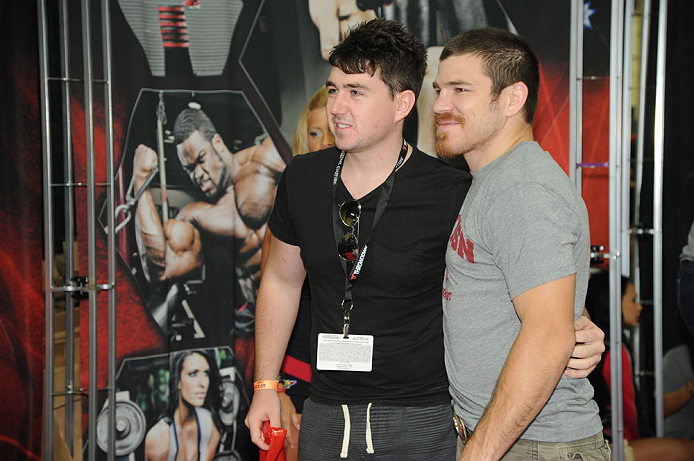 LAS VEGAS, NV - JULY 7:   Jim Miller poses with a fan during the UFC Fan Expo at the Mandalay Bay Convention Center on July 7, 2012 in Las Vegas, Nevada.  (Photo by Al Powers/Zuffa LLC/Zuffa LLC via Getty Images)  *** Local Caption *** 