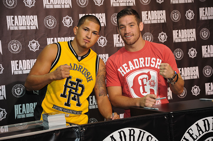 LAS VEGAS, NV - JULY 7: Anthony Pettis and Sam Stout in attendance during the UFC Fan Expo at the Mandalay Bay Convention Center on July 7, 2012 in Las Vegas, Nevada. (Photo by Al Powers/Zuffa LLC/Zuffa LLC via Getty Images) *** Local Caption ***
