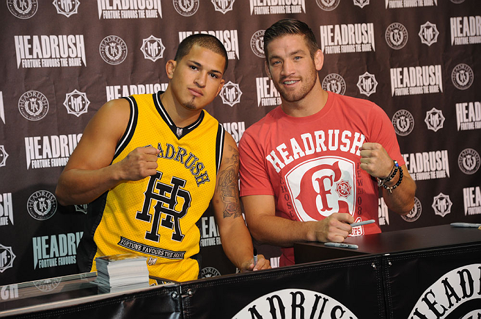 LAS VEGAS, NV - JULY 7:   Anthony Pettis and Sam Stout in attendance during the UFC Fan Expo at the Mandalay Bay Convention Center on July 7, 2012 in Las Vegas, Nevada.  (Photo by Al Powers/Zuffa LLC/Zuffa LLC via Getty Images)  *** Local Caption *** 