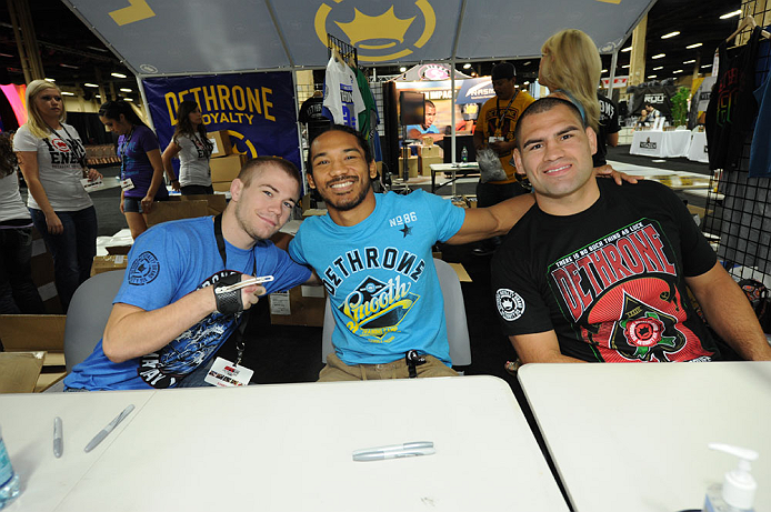 LAS VEGAS, NV - JULY 06: (L-R) Michael McDonald, Benson Henderson and Cain Velasquez pose for fans at the UFC Fan Expo on July 6, 2012 in Las Vegas, Nevada. (Photo by Al Powers /Zuffa LLC/Zuffa LLC via Getty Images)