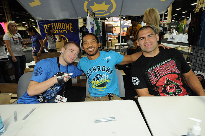 LAS VEGAS, NV - JULY 06:  (L-R) Michael McDonald, Benson Henderson and Cain Velasquez pose for fans at the UFC Fan Expo on July 6, 2012 in Las Vegas, Nevada. (Photo by Al Powers /Zuffa LLC/Zuffa LLC via Getty Images) 