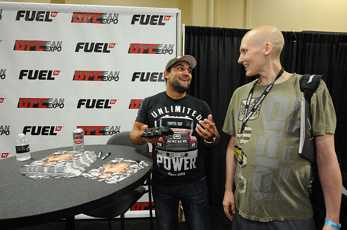 LAS VEGAS, NV - JULY 06:  Johny Hendricks interacts with fans at the UFC Fan Expo on July 6, 2012 in Las Vegas, Nevada. (Photo by Al Powers /Zuffa LLC/Zuffa LLC via Getty Images) 