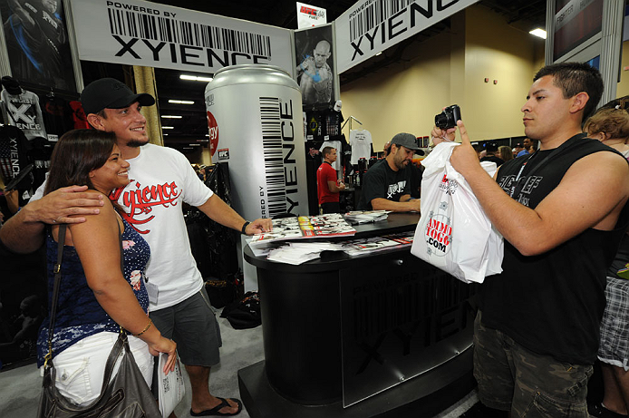 LAS VEGAS, NV - JULY 06: Frank Mir poses with a fan at the UFC Fan Expo on July 6, 2012 in Las Vegas, Nevada. (Photo by Al Powers /Zuffa LLC/Zuffa LLC via Getty Images)