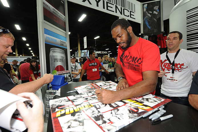 LAS VEGAS, NV - JULY 06: UFC light heavyweight champion Jon "Bones" Jones signs autographs for fans at UFC Fan Expo on July 6, 2012 in Las Vegas, Nevada. (Photo by Al Powers /Zuffa LLC/Zuffa LLC via Getty Images)