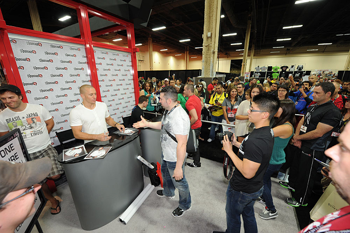 LAS VEGAS, NV - JULY 06:  UFC welterweight champion Georges St-Pierre meets fans at the UFC Fan Expo on July 6, 2012 in Las Vegas, Nevada. (Photo by Al Powers /Zuffa LLC/Zuffa LLC via Getty Images)