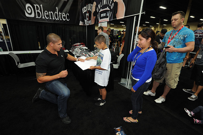 LAS VEGAS, NV - JULY 7: Brendan Schaub signs autographs for fans during the UFC Fan Expo at the Mandalay Bay Convention Center on July 7, 2012 in Las Vegas, Nevada. (Photo by Al Powers/Zuffa LLC/Zuffa LLC via Getty Images) *** Local Caption ***