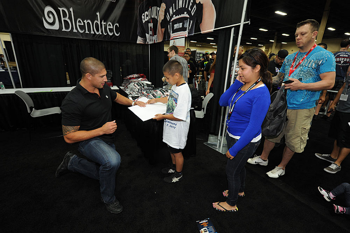 LAS VEGAS, NV - JULY 7:  Brendan Schaub signs autographs for fans during the UFC Fan Expo at the Mandalay Bay Convention Center on July 7, 2012 in Las Vegas, Nevada.  (Photo by Al Powers/Zuffa LLC/Zuffa LLC via Getty Images)  *** Local Caption *** 