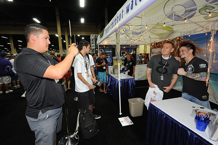 LAS VEGAS, NV - JULY 7:   Scott Jorgensen poses with fans during the UFC Fan Expo at the Mandalay Bay Convention Center on July 7, 2012 in Las Vegas, Nevada.  (Photo by Al Powers/Zuffa LLC/Zuffa LLC via Getty Images)  *** Local Caption *** 