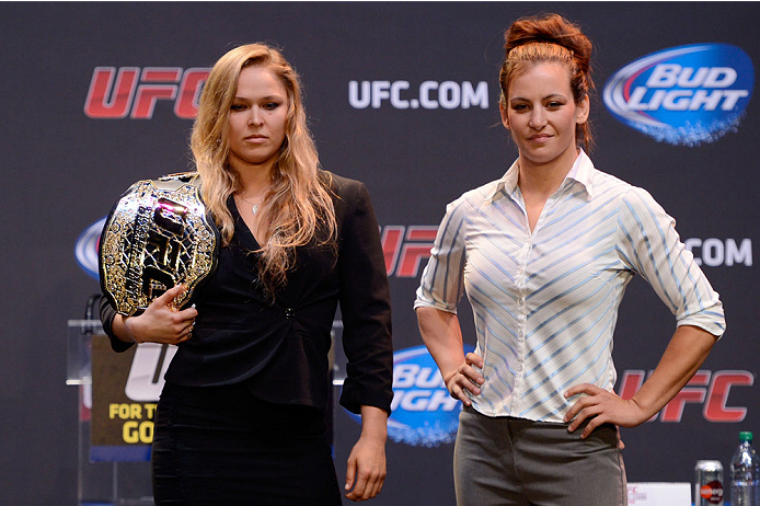 LOS ANGELES, CA - JULY 30:  UFC women's bantamweight champion Ronda Rousey (L) and Miesha Tate face off during the UFC World Tour 2013 at Club Nokia at L.A. Live on July 30, 2013 in Los Angeles, California. Ronda Rousey will defend the UFC women's bantamw