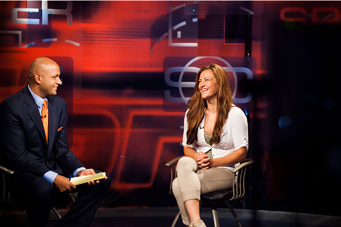 BRISTOL, CT - AUGUST 1: UFC bantamweight fighter Miesha Tate is interviewed by Sportscenter anchor Jorge Andres at ESPN's headquarters on August 1, 2013, in Bristol, Connecticut. Tate will battle bantamweight champion Ronda Rousey in December for the titl