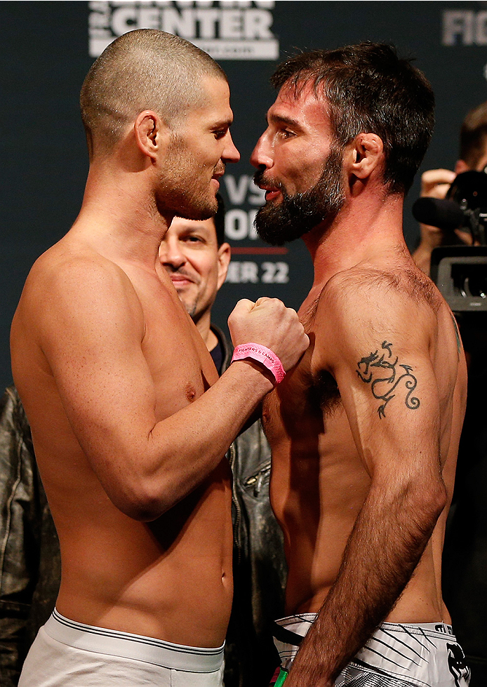 AUSTIN, TX - NOVEMBER 21:  (L-R) Opponents Matt Wiman and Isaac Vallie-Flagg face off during the UFC weigh-in at The Frank Erwin Center on November 21, 2014 in Austin, Texas.  (Photo by Josh Hedges/Zuffa LLC/Zuffa LLC via Getty Images)