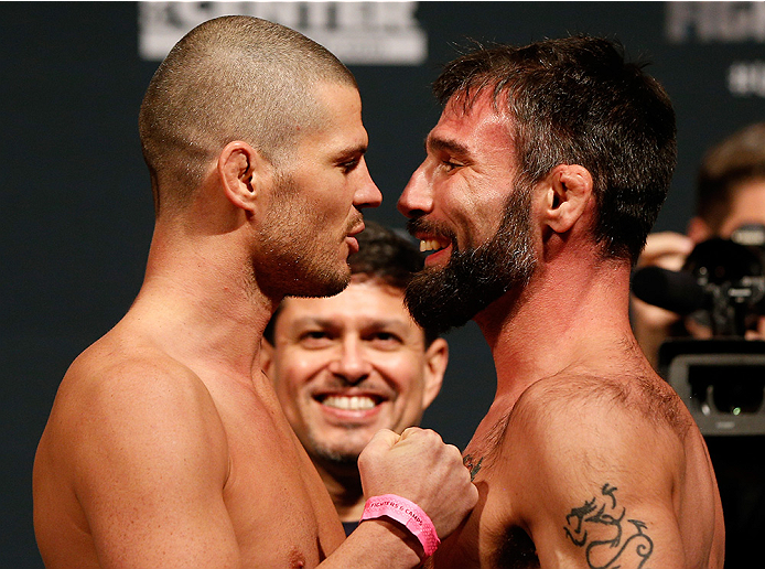 AUSTIN, TX - NOVEMBER 21:  (L-R) Opponents Matt Wiman and Isaac Vallie-Flagg face off during the UFC weigh-in at The Frank Erwin Center on November 21, 2014 in Austin, Texas.  (Photo by Josh Hedges/Zuffa LLC/Zuffa LLC via Getty Images)