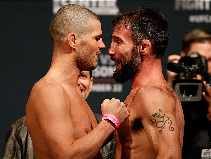 AUSTIN, TX - NOVEMBER 21:  (L-R) Opponents Matt Wiman and Isaac Vallie-Flagg face off during the UFC weigh-in at The Frank Erwin Center on November 21, 2014 in Austin, Texas.  (Photo by Josh Hedges/Zuffa LLC/Zuffa LLC via Getty Images)