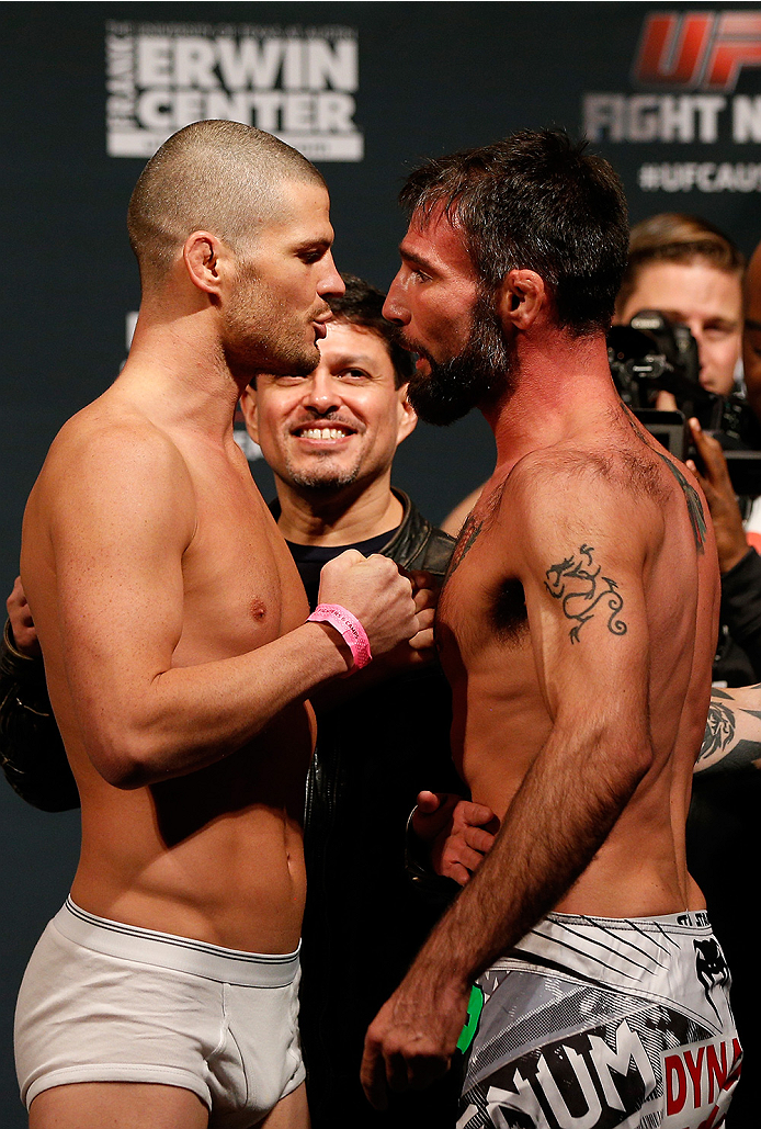 AUSTIN, TX - NOVEMBER 21:  (L-R) Opponents Matt Wiman and Isaac Vallie-Flagg face off during the UFC weigh-in at The Frank Erwin Center on November 21, 2014 in Austin, Texas.  (Photo by Josh Hedges/Zuffa LLC/Zuffa LLC via Getty Images)