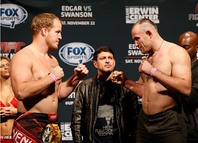 AUSTIN, TX - NOVEMBER 21:  (L-R) Opponents Jared Rosholt and Alexey Oliynyk of Russia face off during the UFC weigh-in at The Frank Erwin Center on November 21, 2014 in Austin, Texas.  (Photo by Josh Hedges/Zuffa LLC/Zuffa LLC via Getty Images)