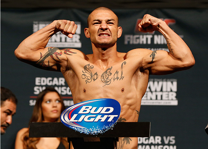 AUSTIN, TX - NOVEMBER 21:  Cub Swanson poses on the scale after weighing in during the UFC weigh-in at The Frank Erwin Center on November 21, 2014 in Austin, Texas.  (Photo by Josh Hedges/Zuffa LLC/Zuffa LLC via Getty Images)