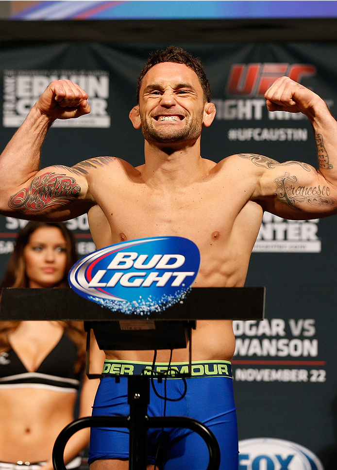 AUSTIN, TX - NOVEMBER 21:  Frankie Edgar poses on the scale after weighing in during the UFC weigh-in at The Frank Erwin Center on November 21, 2014 in Austin, Texas.  (Photo by Josh Hedges/Zuffa LLC/Zuffa LLC via Getty Images)