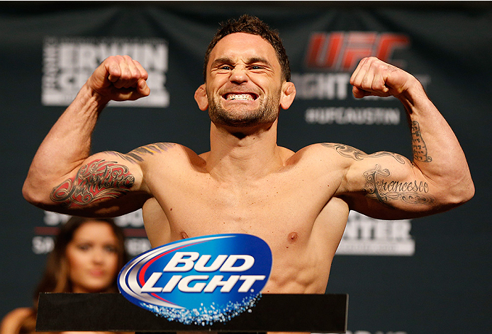 AUSTIN, TX - NOVEMBER 21: Frankie Edgar poses on the scale after weighing in during the UFC weigh-in at The Frank Erwin Center on November 21, 2014 in Austin, Texas. (Photo by Josh Hedges/Zuffa LLC/Zuffa LLC via Getty Images)